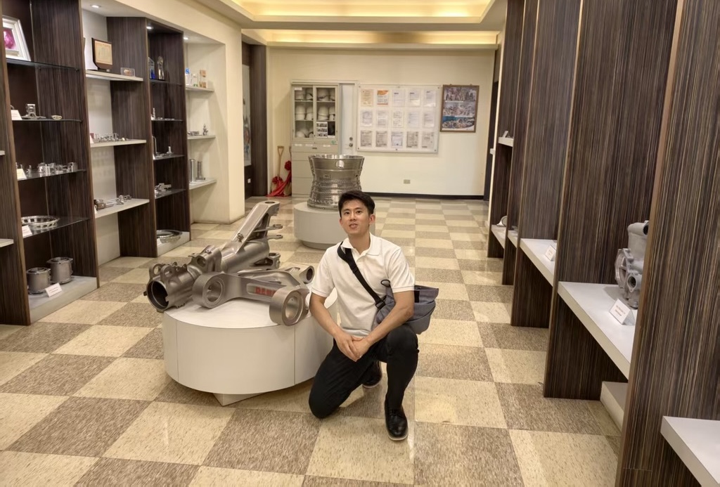 Bert in Aerospace CNC showroom with titanium landing gear part and engine structural parts