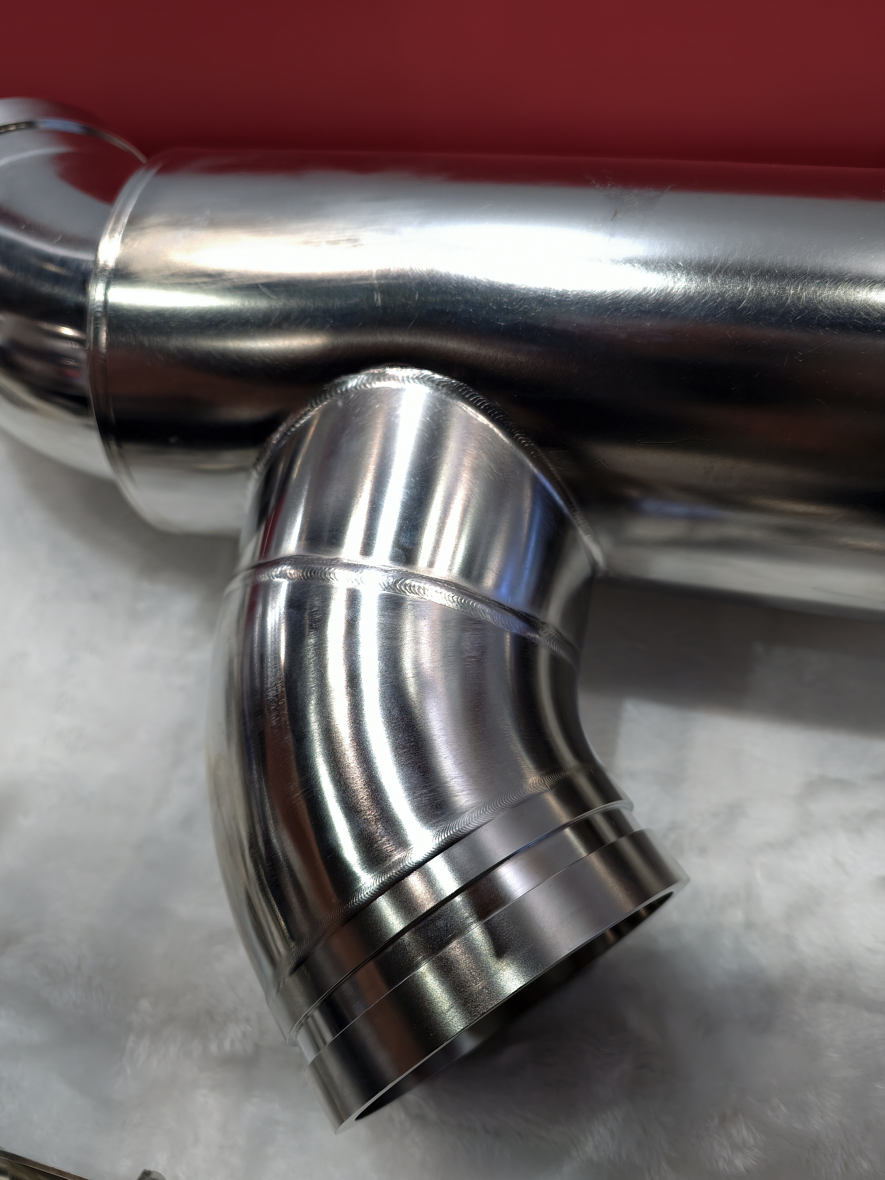 Close-up of a welded stainless joint for leak-proof cooling construction.