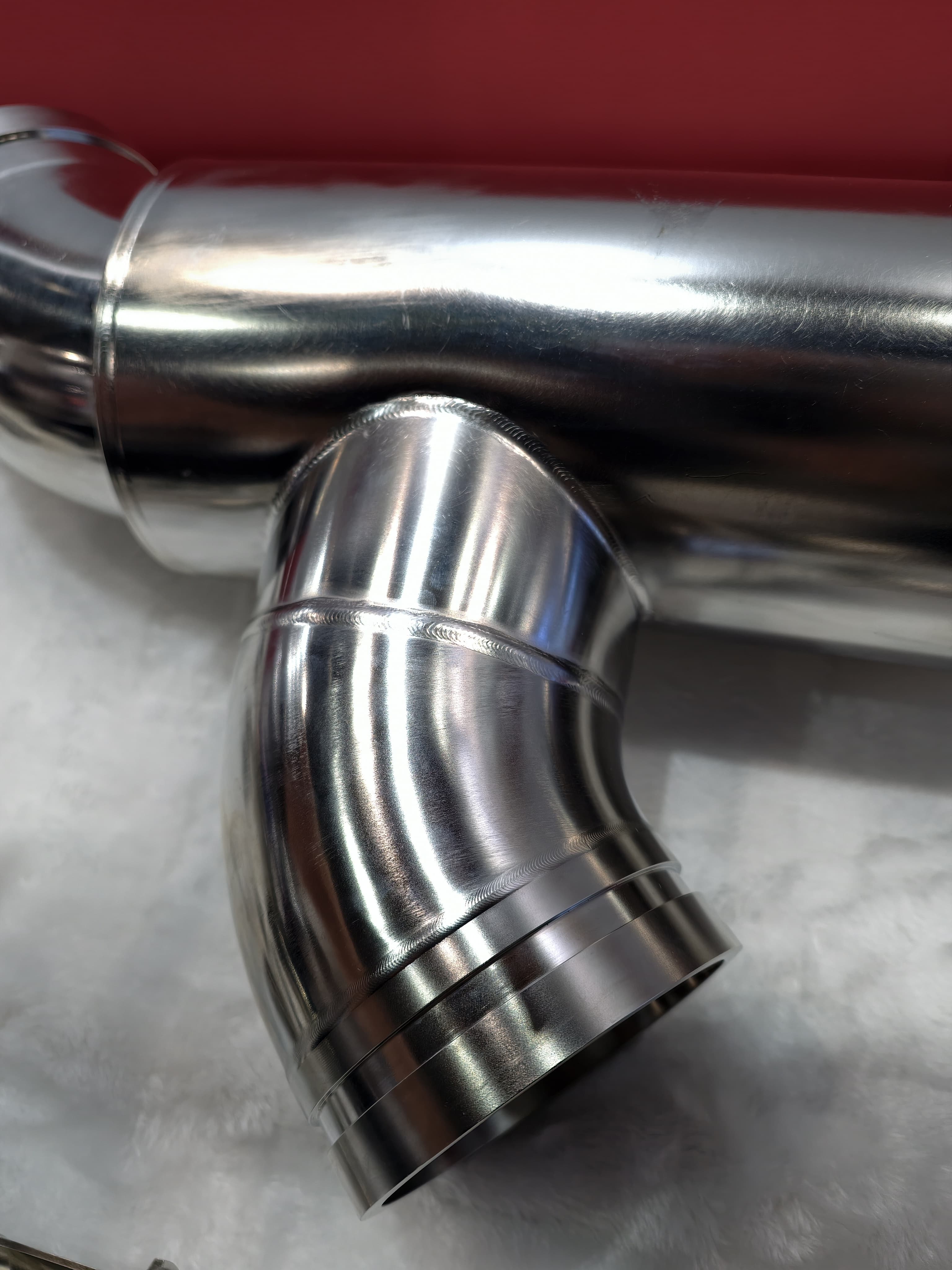 Close-up of a welded stainless joint for leak-proof cooling construction.